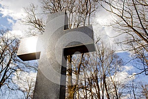 Shinny cross symbol of Jesus Christ resurrection and salvation. photo
