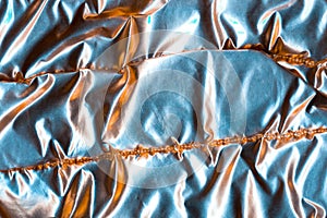 Shiny abstract background stitched fabric texture