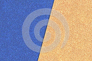 Shiny background of blue and gold yellow paper with glitters , low contrast