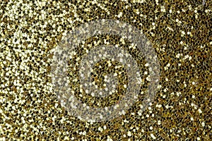 Shiny background for layouts and websites. Gold sequins close up