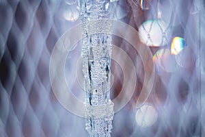 Shiny background of pieces of crystal and glass icicles