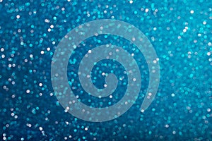 Shiny blue defocused glitter background