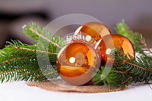 Shiny bright copper colored Christmas balls photo