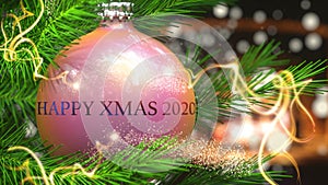 Shiny Christmas ornament ball with a phrase Happy xmas 2020 to symbolize warmth and importance of Christmas Holidays, 3d