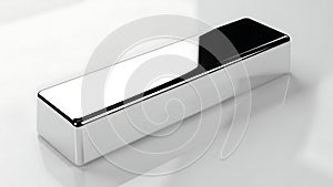 Shiny chrome rectangular prism object on a white reflective surface