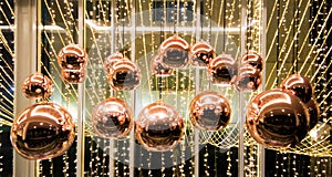 Shiny copper sphere lamps.
