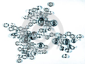 Shiny diamonds stones laying on white table