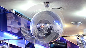 Shiny disco ball on nightclub