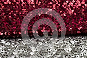 Shiny fabric on the border of red and silver