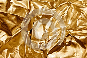 Shiny Foil Crumpled in Sharp Crumpled Metallic Gloss Background Gold
