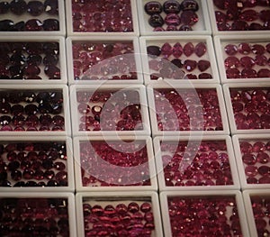 Shiny gems, multicolored glass pebbles, background, texture