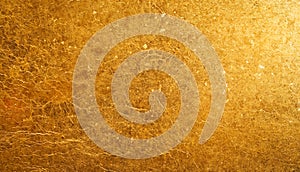 Shiny gold background made of rough textured gold paper