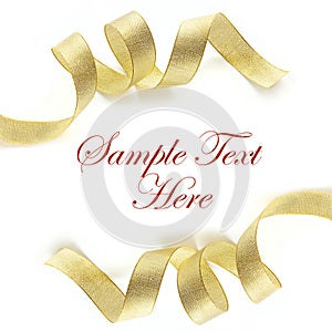 Shiny gold satin ribbon on white background photo