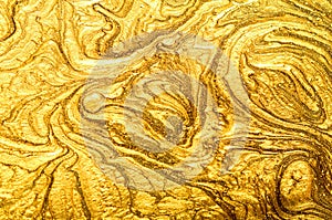 Shiny gold textured background.