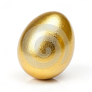Shiny Golden Egg isolated on white background photo