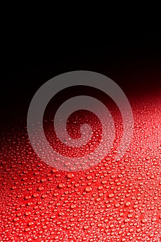 Shiny gradient black and red smooth surface photo