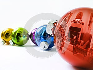 Shiny Holiday Ornaments Reflect Brightly Lit Color