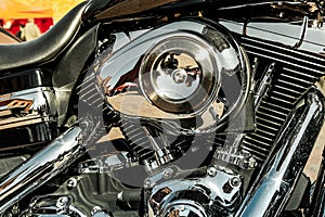 A shiny motorcycle engine close up