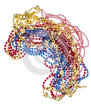 Shiny multi colored mardi gras beads including blue, red, gold and pink on white background