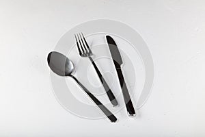 Shiny new cutlery, silverware close-up on white background