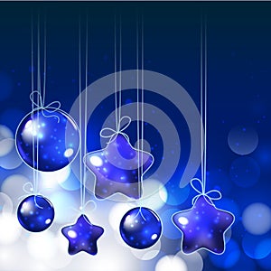 Shiny ornaments and lights on blue background for holy christmas