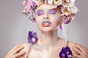 Shiny portrait young adult woman with wreath on head