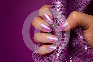 Shiny purple nails manicure