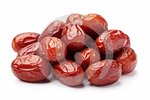 Shiny red dried jujubes isolated on a white backdrop. Ziziphus fruit in a dried state for snacking. Concept of healthful