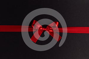 Shiny red satin ribbon bow