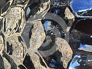 Shiny,, Reflective Black Ceramic Garden Pottery Detail