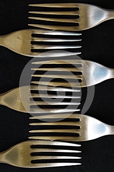 Shiny sharp metal teeth of the culinary instrument photo