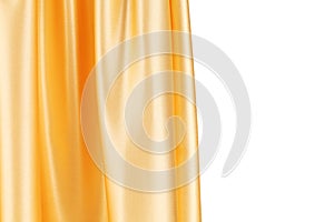 Shiny silk orange drapery.
