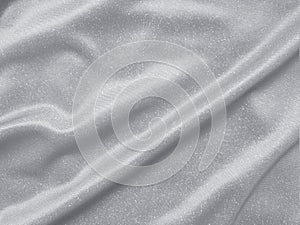 Shiny silver crumpled fabric texture background