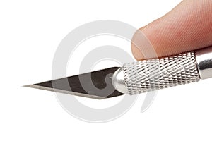 A shiny silver cutting utensil