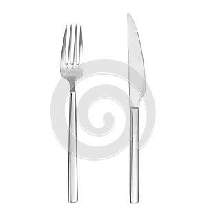 Shiny silver knife and fork on white background, top view