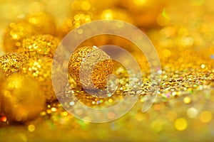 shiny sphere made of golden glitters with sparkles and glares