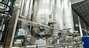 Shiny stainless steel pipes, tanks for the food industry