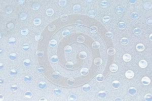 Shiny textured silver background with circles