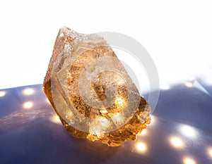 Shiny transparent quartz crystals isolated on shiny white background. Found in Volodarsk Volynsky, Ukraine. For geology