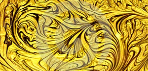 Shiny yellow leaf dark gold foil texture background.