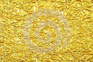 Shiny yellow leaf gold foil texture background