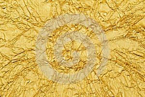 The shiny yellow leaf gold foil texture background