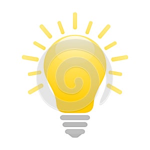 Shiny yellow light bulb icon with rays. Idea and creativity symbol.