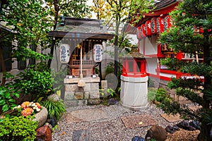 Shiogama shrine close to Hinode Inari Shinto shrine at Nishiki Tenmangu Shrine area, Kyoto, Japan photo