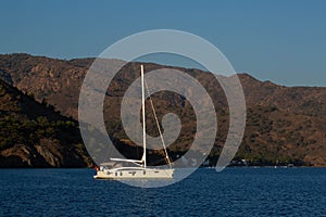 Ship on the Aegean Sea at the sunset active vacation