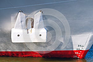 Ship with anchor and draft scale numbering side on waterline