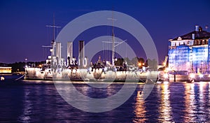 Ship Aurora in St. Petersburg, Russia, at night in June. The Neva River in St. Petersburg. Night city.