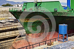 Ship being cleaned in drydock