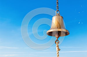 Ship bell against the sky