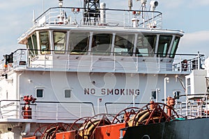 Ship bridge for navigation and control. Cargo ship waiting for a captain and crew. Vessel is ready to shove off and start new photo